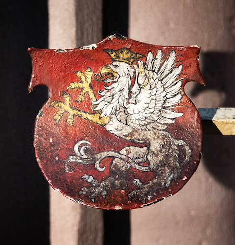 The Stürtzel coat of arms on the left side of the chapel grille