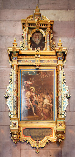 The lavishly decorated epitaph commemorates the cathedral priest, university professor and later vicar general of the Basel cathedral chapter, Georg Hänlin († 1612). The Renaissance frame, richly decorated with architectural elements and gilded ornaments, frames two paintings. The large painting depicts Christ's descent into hell, the smaller one the resurrection. Hänlin's tomb slab is located on the left-hand window wall.