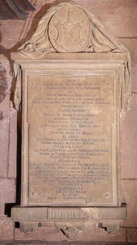 The classicist epitaph made of grey sandstone is dedicated to Nikolaus von Zwergers (d. 1778), a councillor from Upper Austria, and his daughter Sophia († 1779).