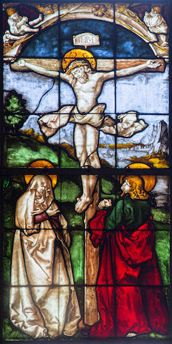 In the foreground, the crucifixion group with the mourning Mary and the disciple John is gathered around the crucified Jesus. The landscape in the background is characterised by a great wealth of detail.