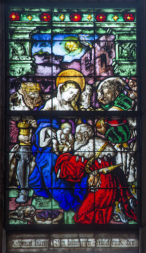 Konrad Stürtzel is gazing to the left towards the Virgin Mother and the Magi adoring the Child.